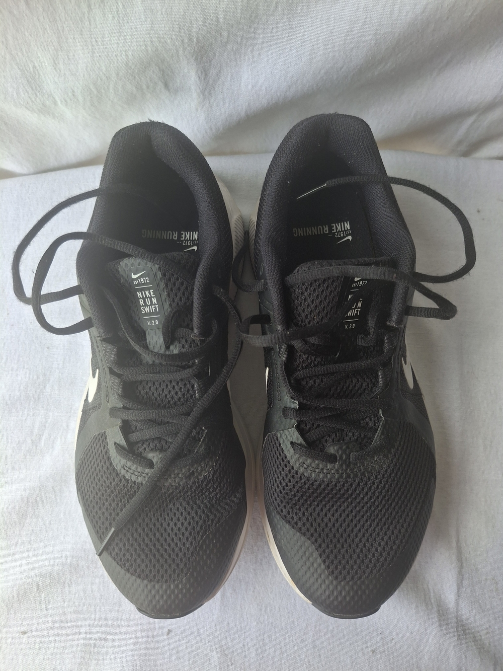 Nike Black Mesh Running Shoes with White Swoosh